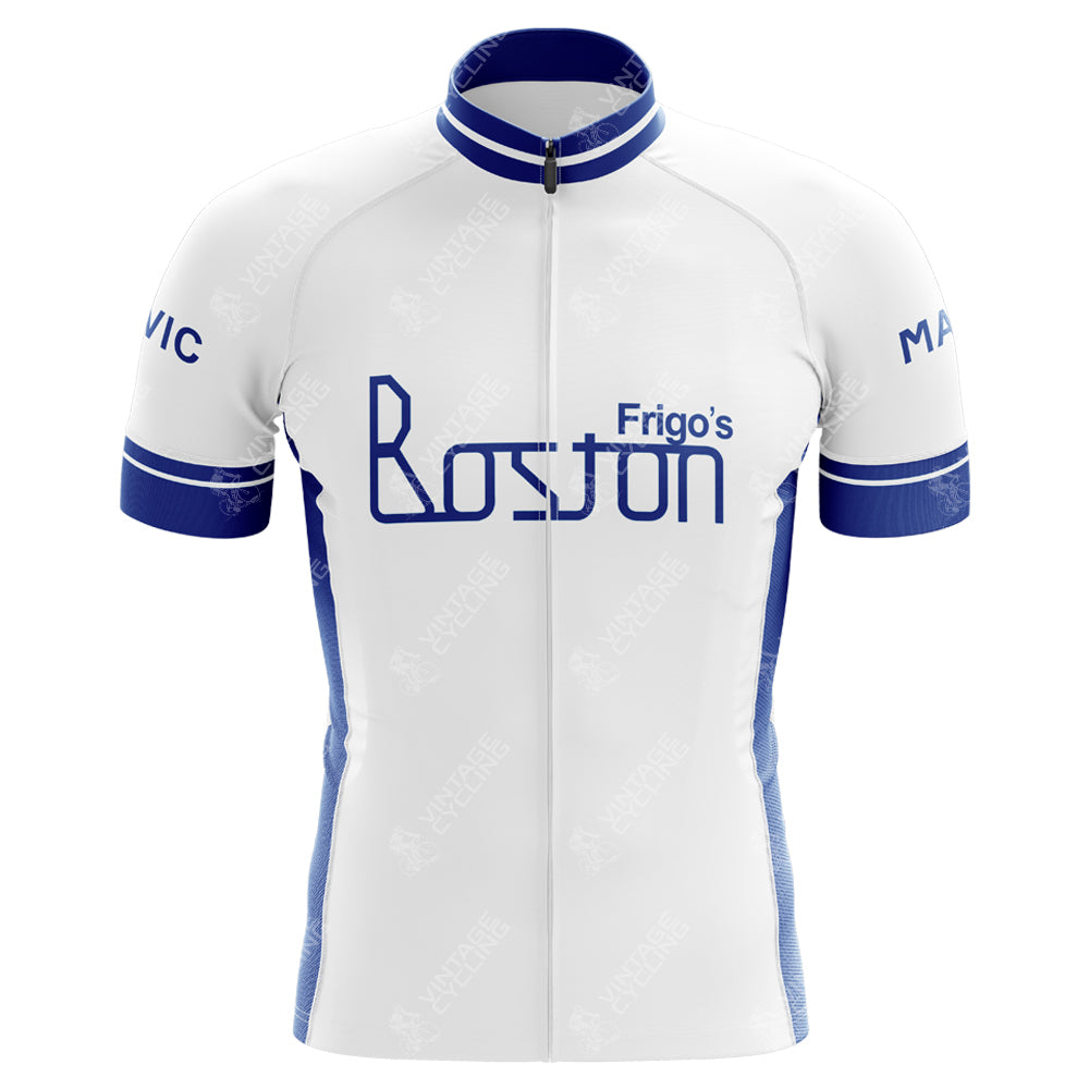 The Frigos Boston Retro Cycling Jersey showcases a white and blue design with Frigos Boston on the chest, crafted from lightweight polyester. Blue stripes enhance the sleeves and collar, merging style with performance.