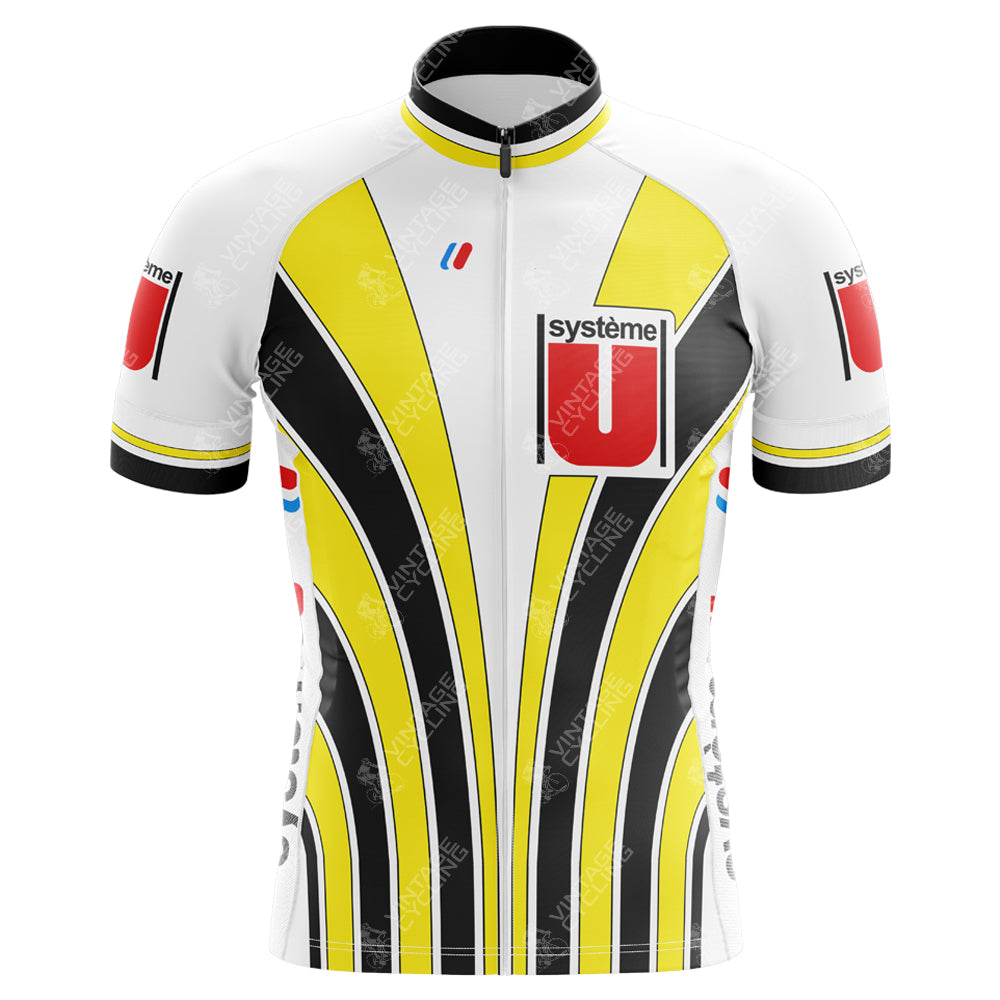 The Système U Gitane Retro Cycling Jersey combines black and yellow stripes on white, with red and black shoulder rectangles. It evokes the vintage charm of Gitane racing bikes, featuring système printed boldly on the chest.