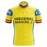 The IJsboerke-Warncke Eis Retro Cycling Jersey showcases JSBOERKE, WARNCKE, and EIS on the front, with blue logos on the sleeves. Red, black, and yellow stripes highlight the neckline and cuffs. A white zipper adorns the front, while blue and yellow panels complete this design.