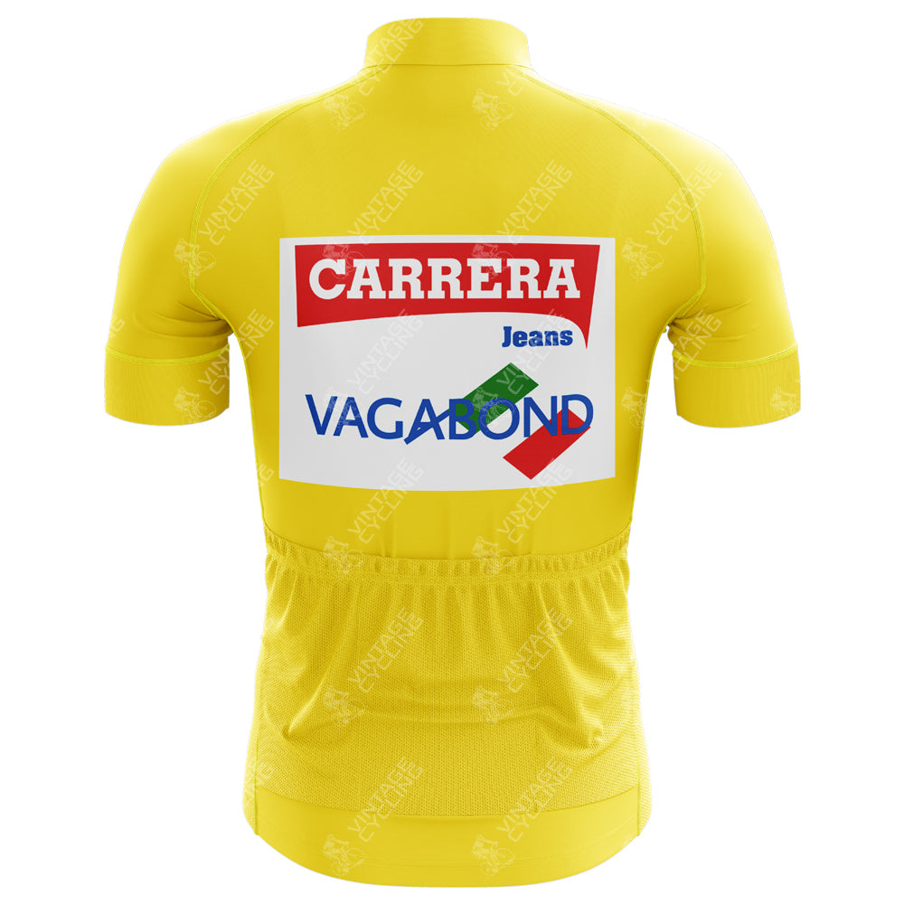 The Carrera Jeans 1987 Tour de France Retro Cycling Jersey comes in yellow, is short-sleeved, zip-up, and has CARRERA Jeans and VAGABOND logos on the back with convenient pockets at the lower back.