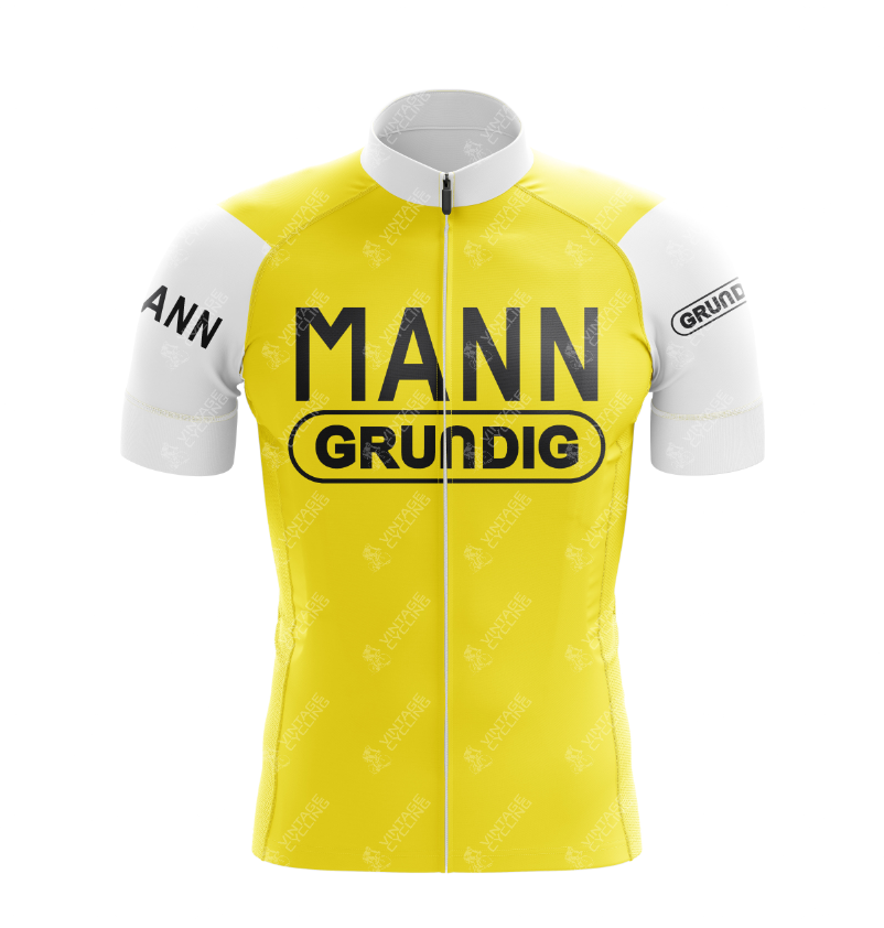 The Mann Grundig Retro Cycling Jersey is a yellow, short-sleeved design with black text on the chest, white sleeves featuring additional text. Made of lightweight polyester, it includes a front zipper and offers a form-fitting design for optimal performance.
