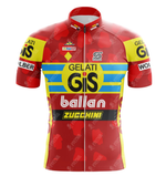 The GiS Gelati 1991 Retro Cycling Jersey showcases a vibrant red, yellow, and blue design. It features sponsor logos like diadora, Sergio, ballan, and ZUCCHINI. This classic piece has short sleeves and a full zipper, adding to its nostalgic charm.