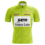 The France-Loire SEM Green Jersey is a vintage 1982 Tour de France retro cycling jersey in bright green with a front zipper, featuring logos like SEM, Michelin, Le Parisien, and France-Loire—ideal for enthusiasts or as a classic nod to Tour de France style.