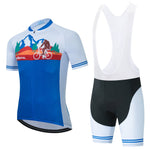 The Big Foot Sasquatch Cycling Jersey Set is made from lightweight polyester, featuring a mountain/cyclist graphic and believe text in blue and white with red and green accents. The bib shorts include a gel seat pad, Big Foot theme, and blue-striped leg bands.