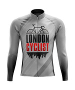 The London Cyclist Retro Cycling Jersey, available with a fleece option, sports a black bicycle silhouette and bold London Cyclist text on a subtle city skyline background with diagonal gray stripes. It features long sleeves and a front zipper for added style and comfort.