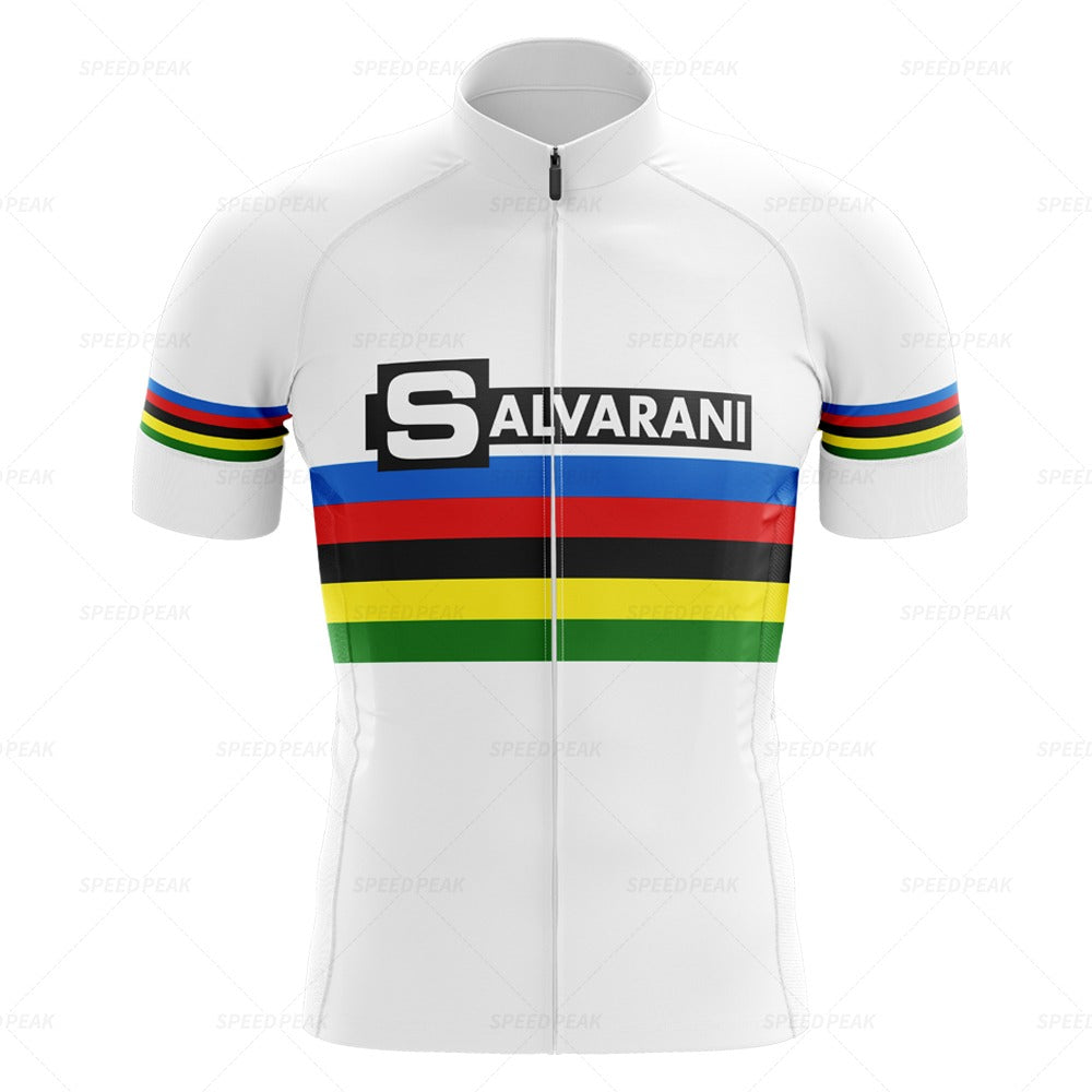 The Salvarani 1972 Retro Cycling Jersey Set features horizontal rainbow stripes with a black and white Salvarani logo across the chest, evoking Felice Gimondis iconic style. The jersey includes blue, red, black, yellow, and green stripes with short sleeves and a front zipper.