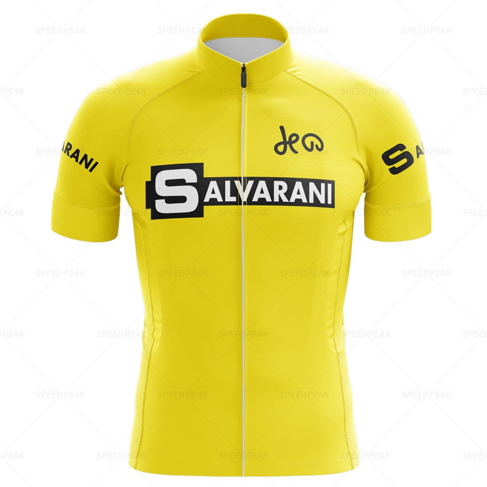The Salvarani 1972 Retro Cycling Jersey Set features a yellow short-sleeve jersey with Salvarani logos on the chest and arms, a white zip down the center, and black text that recalls Felice Gimondis iconic 1972 rides.