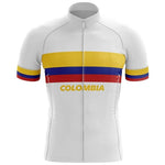 The Colombia Pro Team Cycling Jersey showcases lightweight polyester with horizontal yellow, blue, and red stripes of the Colombian flag across the chest and sleeves. Colombia is elegantly inscribed in yellow beneath these vibrant stripes. It offers a seamless fit with a front zipper closure for optimal cycling performance.