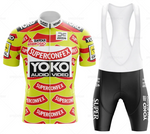 The YOKO Superconfex Retro Cycling Jersey Set captures performance cyclings essence with a yellow jersey featuring red and white YOKO Superconfex and Yoko Audio Video logos, paired with black bib shorts showcasing bold white text for timeless style.