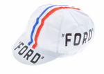 The FORD Retro Cycling Cap boasts a classic white design with bold blue and red stripes, elegantly featuring FORD in black on the front and side, embodying vintage cycling style.