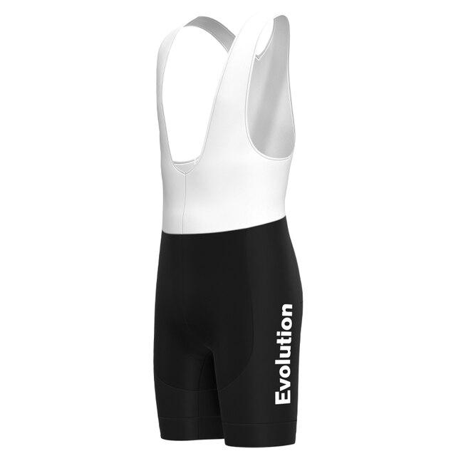 The Evolution Bib Shorts feature a sleek black and white design with a gel pad seat for comfort, vertical Evolution print on the left thigh, and an aerodynamic fit, making them ideal for long rides.