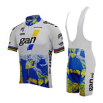 Cycle stylishly with the Gan Retro Cycling Jersey Set, featuring a white, blue, and yellow abstract design. The short-sleeve jersey and matching bib shorts prominently display gan and include a breathable gel seat pad for comfort. Black logos and multicolor sleeve accents complete the vibrant look.