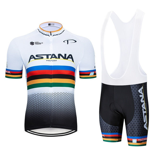 The Astana Team Cycling Jersey Set features a jersey and bib shorts with horizontal rainbow stripes and a hexagonal pattern. Made from lightweight polyester, the black bib shorts include a comfortable seat pad with matching detailing for an optimal ride experience.