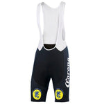 The Corona Beer Bib Shorts have white straps and black shorts, with Corona and palm tree graphics on the legs. Designed for comfort with a gel pad seat and made from stretchy polyester for a snug fit.