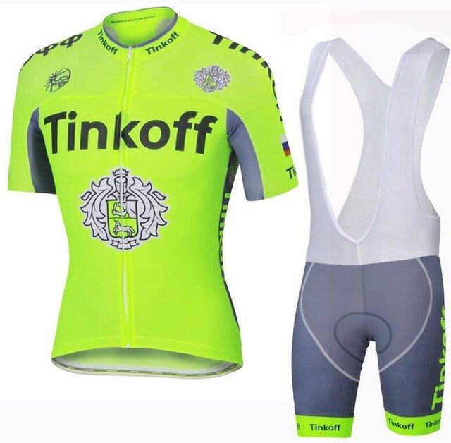 The Tinkoff Light Green Set includes a cycling jersey and matching bib shorts in bright yellow and gray. Made from lightweight, breathable polyester, it features Tinkoff branding on the front and arms, a crest logo, short sleeves, and a zipper front for optimal riding comfort.