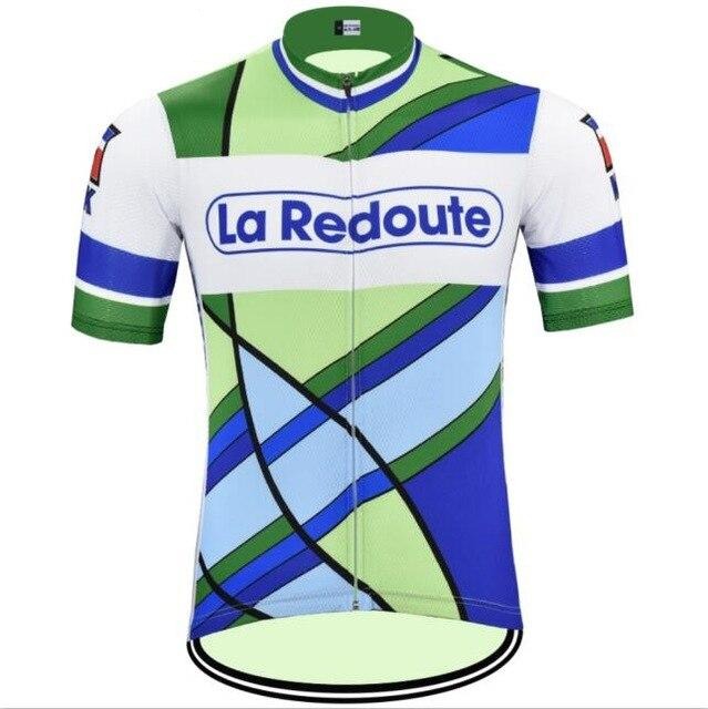 The La Redoute Retro Cycling Jersey Set showcases a bold geometric design in green, blue, and white with curved lines. The chest features La Redoute, and the short sleeves have star designs, evoking a classic vibe.