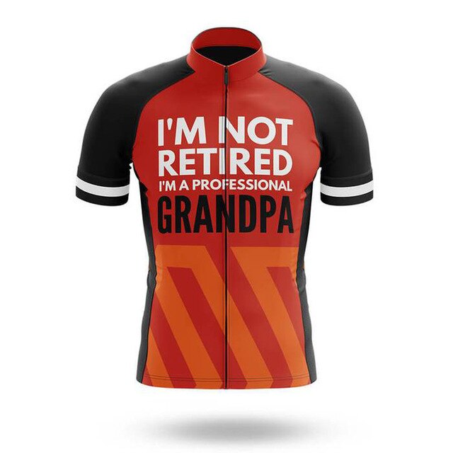 The Retired Grandpa Cycling Jersey is a lightweight polyester cycling jersey in black and red, featuring bold Im not retired, Im a professional grandpa text. It includes breathable material, short sleeves with white stripes, and a front zipper for convenience.