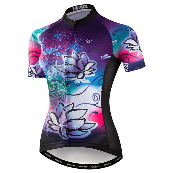 The Womens Water Lily Cycling Jersey is a lightweight, colorful polyester option featuring lotus flowers, swirls, and abstract splashes in purple, blue, pink, and black hues. It has short sleeves and a front zipper for convenience.
