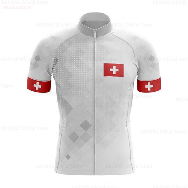 The Swiss Pro Team Cycling Jersey, made of lightweight polyester, features red Swiss flags on the sleeves and a subtle geometric pattern. It has a full zip and a prominent Swiss flag on the chest, ideal for any Switzerland-themed cycling enthusiast.
