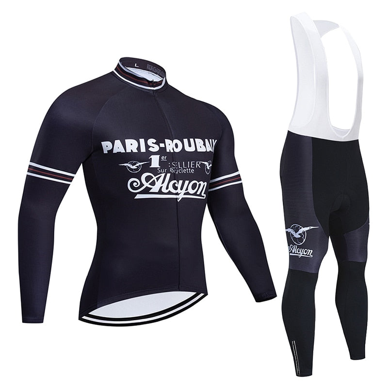 The Paris-Roubaix Retro Cycling Jersey Long Set, with optional fleece, features a black long-sleeve jersey with white logos and bib tights that include white straps and matching thigh logo details.