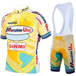 The Mercatone Uno Retro Cycling Jersey Set includes a yellow and blue short-sleeve jersey with a front zipper and matching bib shorts, featuring Mercatone Uno and Girmi logos, with geometric patterns inspired by Marco Pantanis iconic style.