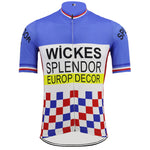 The Wickes Splendor Europ Decor 1981 Retro Cycling Jersey features short sleeves in lightweight polyester, a blue top with a red, white, and blue checkered pattern at the bottom. WICKES, SPLENDOR, and EUROP DECOR are featured on it, with blue, red, and white stripes on the sleeves and collar.