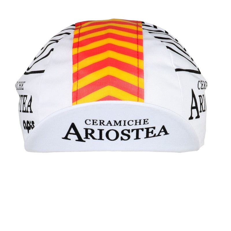 The Ceramiche Ariostea Retro Cycling Cap features a classic design with a crisp white background and a bold central orange and yellow chevron pattern running vertically.