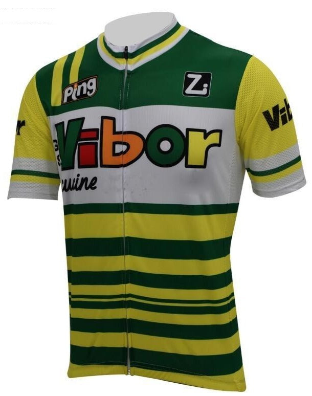 The G.S. Vibor Cucine Retro Cycling Jersey is made from lightweight polyester and features a green, yellow, and white striped design with bold Vibor branding on the front, chest, and sleeves. A silicone waist strip ensures a secure fit for every ride.