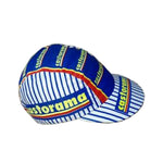 The Castorama Retro Cycling Cap features a vibrant design with vertical blue and white stripes, classic retro style showcasing castorama in yellow letters on a blue background with red and yellow borders, repeated horizontally.