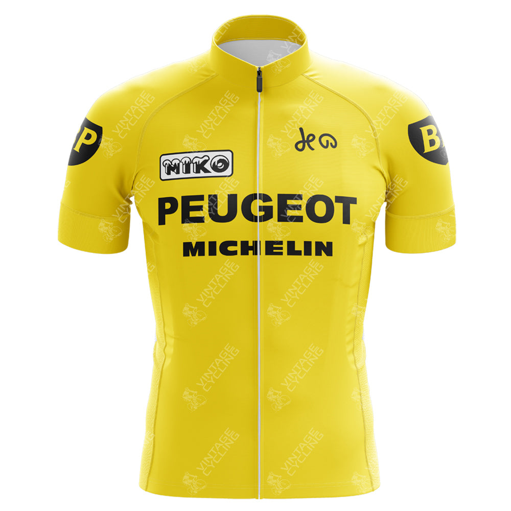 The Miko Peugeot BP Retro Cycling Jersey features a vibrant yellow design with iconic logos like Miko, Peugeot, BP, and Michelin. It has stylized sleeve details and a full front zipper, reflecting classic cycling sponsorship history.