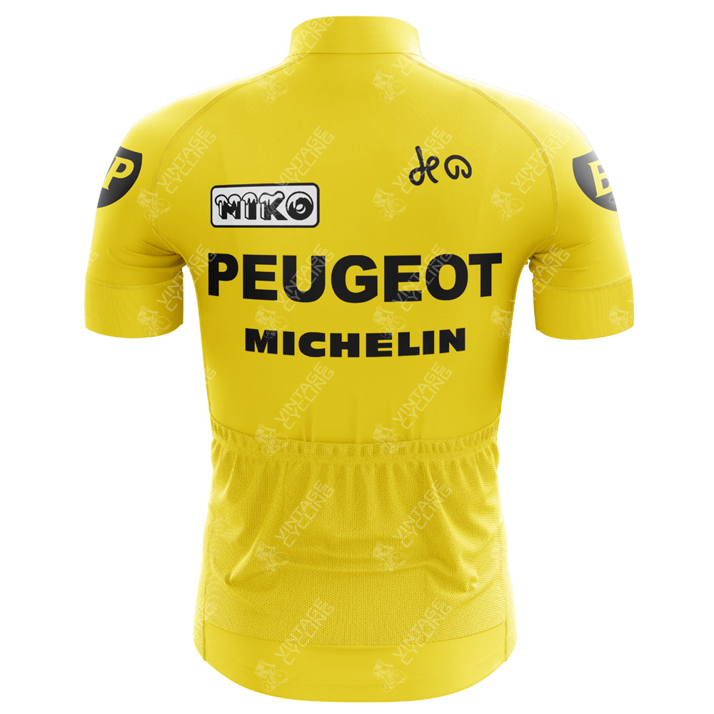 The Miko Peugeot BP Retro Cycling Jerseys back showcases a yellow design with bold black PEUGEOT, MICHELIN, and NIKO logos, capturing the vintage spirit of classic cycling sponsorships. Additional small logos embellish the sleeves and upper back.