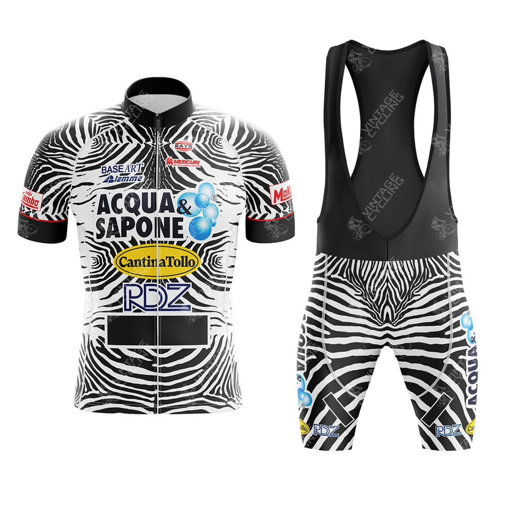 The Acqua Sapone Cantina Tollo Zebra Retro Cycling Jersey Set boasts bold zebra-print stripes and striking logos from Acqua & Sapone, RDZ, and Cantina Tollo, ideal for avid competitive cyclists.