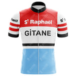 The St Raphael Quinquina Gitane Retro Cycling Jersey boasts a lightweight polyester design with a red, white, and light blue color scheme. The red top features St Raphaël in white, the white middle displays GITANE in black, and the light blue bottom is accented by sleeves with black stripes and St Raphaël.