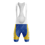 The front view of the Mercier Retro Short Sleeve Cycling Set bib showcases a blue, yellow, and white design with MERCIER printed in white on the colorful sections. The upper section is crisp white with supportive shoulder straps, giving it a classic cycling jersey style.