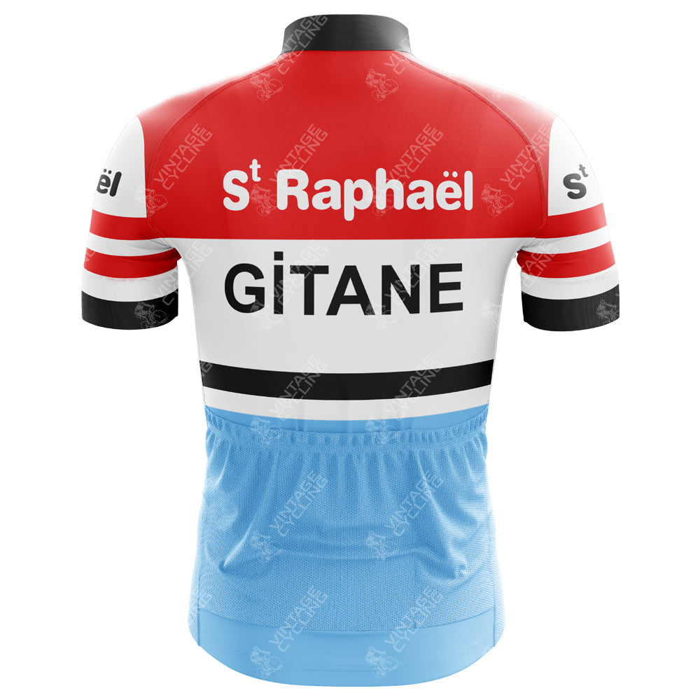 The St Raphael Quinquina Gitane Retro Cycling Jersey showcases St Raphaël and GITANE on lightweight polyester with a red top, black and white striped sleeves, and a light blue lower section.