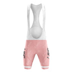 The BIC Pink Retro Short Sleeve Cycling Set features pink and white bib shorts with BIG in bold black, echoing a retro cycling vibe. The white upper has shoulder straps for a secure fit, and the fabrics textured design is reminiscent of vintage cycling gear.