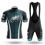 The Red Badgers Short Sleeve Cycling Set features a retro design in black, green, and white with bold PHILADELPHIA text, an eagle graphic, and the Eagles logo. Customizable sizing ensures a perfect fit for every cyclist.