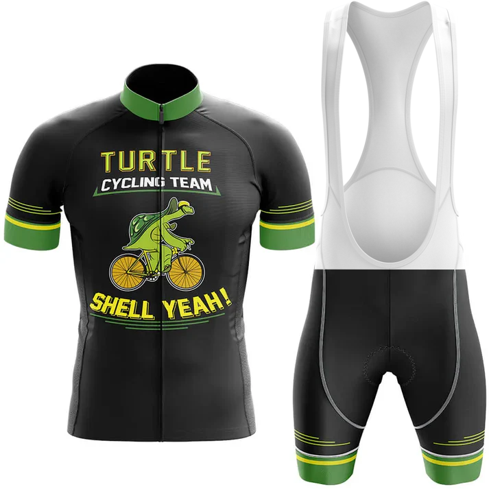 The Wales Men Short Sleeve Cycling Set features a black and green jersey with a cartoon turtle on a bike and "Turtle Cycling Team Shell Yeah!" text; matching bib shorts complete this fun Chicago cycling kit.