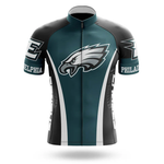 The Red Badgers Short Sleeve Cycling Set features a retro design with the team’s logo on the front, team colors in red and white, “Red Badgers” text on the sleeves, and customizable sizing for a perfect fit for every fan.