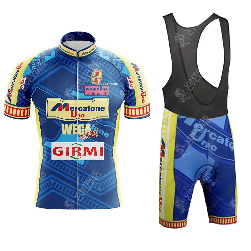 The Todeka Magicreme Retro Short Sleeve Cycling Set features a blue and yellow jersey with Mercatone Uno and Girmi logos, geometric patterns, zip-up front, and matching bib shorts with black straps.