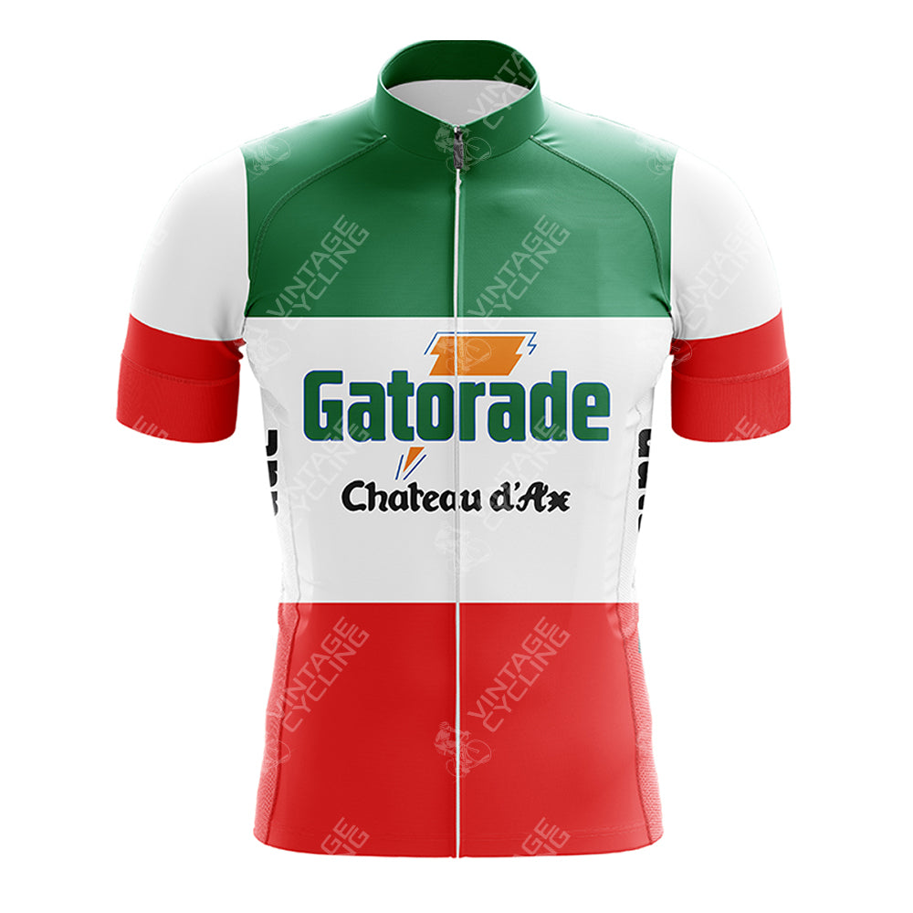The Gazzola Retro Short Sleeve Cycling Set includes a jersey with green, white, and red stripes like the Italian flag and features Gatorade and Chateau dAx logos. Available in various sizes for both jerseys and shorts to ensure the perfect fit.