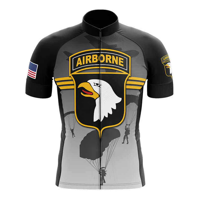 The Denmark Red Men Short Sleeve Cycling Set features a bold Airborne badge with an eagle head, yellow stripes, parachutist silhouettes, and a U.S. flag patch on the sleeve—ideal for cycling enthusiasts.