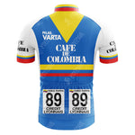 The back of the CAFE D COLOMBIA Retro Cycling Jersey showcases a vibrant design with blue, white, yellow, and red sections. Café de Colombia is prominent, along with number 89 and Fabio Parras name above Credit Lyonnais. Made from lightweight polyester for superior comfort.