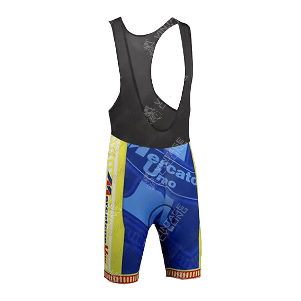 The Todeka Magicreme Retro Short Sleeve Cycling Set features blue and yellow cycling bib shorts with black straps, a large Zucato Uno logo on the front, colorful side panels, and is displayed on a plain white background.