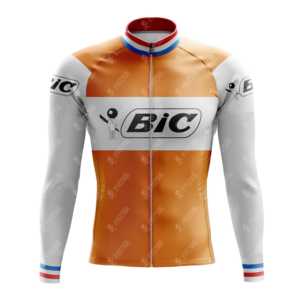 The BIC Orange Retro Long Sleeve Cycling Set features a mix of orange, white, and gray with a front zipper. Bic logos adorn the chest, sleeves, and shoulders, while red and blue stripes add vibrancy to the collar and cuffs.