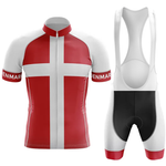 The Believe Men Short Sleeve Cycling Set features a red and white jersey with a bold white cross inspired by the Denmark flag, "DENMARK" on the sleeves, and black bib shorts with red and white accents for a sleek, performance look.