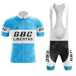 The Gios Torino Retro Short Sleeve Cycling Set is a blue and white vintage-inspired cycling jersey and bib shorts combo, branded G.B.C. - LIBERTAS in black. The set includes a front zipper on the jersey and straps on the bib shorts, offering timeless style and functionality.