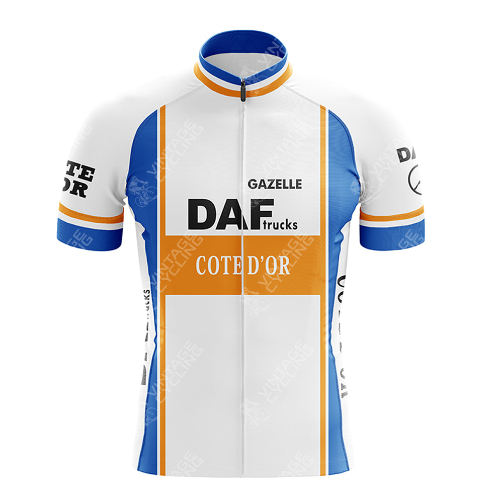 The FESTINA Retro Short Sleeve Cycling Set includes a white cycling jersey with blue and orange vertical stripes, featuring bold GAZELLE, DAF trucks, and COTE DOR on the front, while the sleeves have additional text with a blurred design.