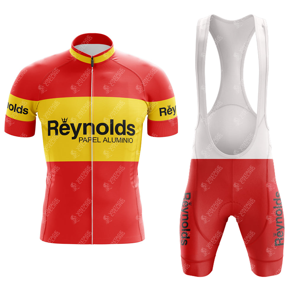 Embrace the 1980s with our 1980s red Reynolds Retro Short Sleeve Cycling Set. Featuring a vibrant red and yellow full-zip jersey with the iconic Reynolds logo and matching bib shorts, this outfit offers an authentic vintage look.