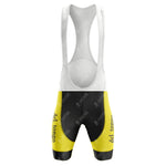 The vintage style of the 1983 del tongo Retro Short Sleeve Cycling Set is highlighted by yellow and black bib shorts with del tongo text on the legs, complemented by white shoulder straps against a plain backdrop.